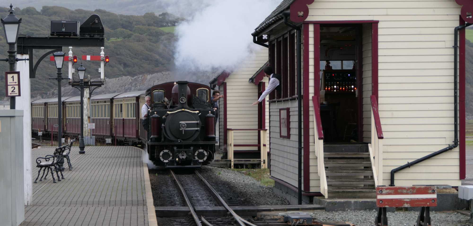 Steam train entering Porthmadog station