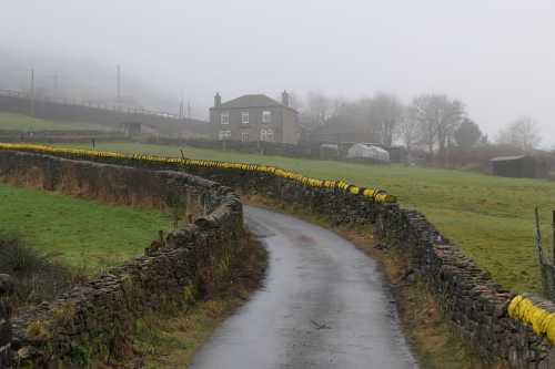 Wall capping stones painted yellow in attempt to stop theft