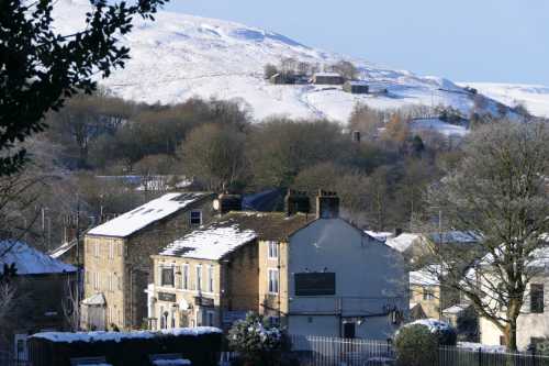 Snowy Marsden, looking over the New Inn towards the Pennines