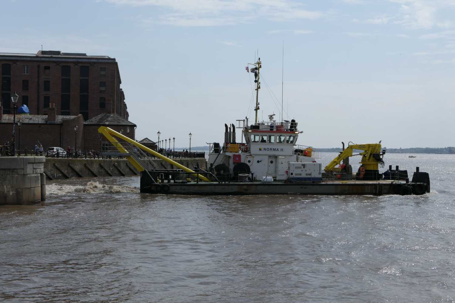 Dredger dredging the lock at the Albert dock, two