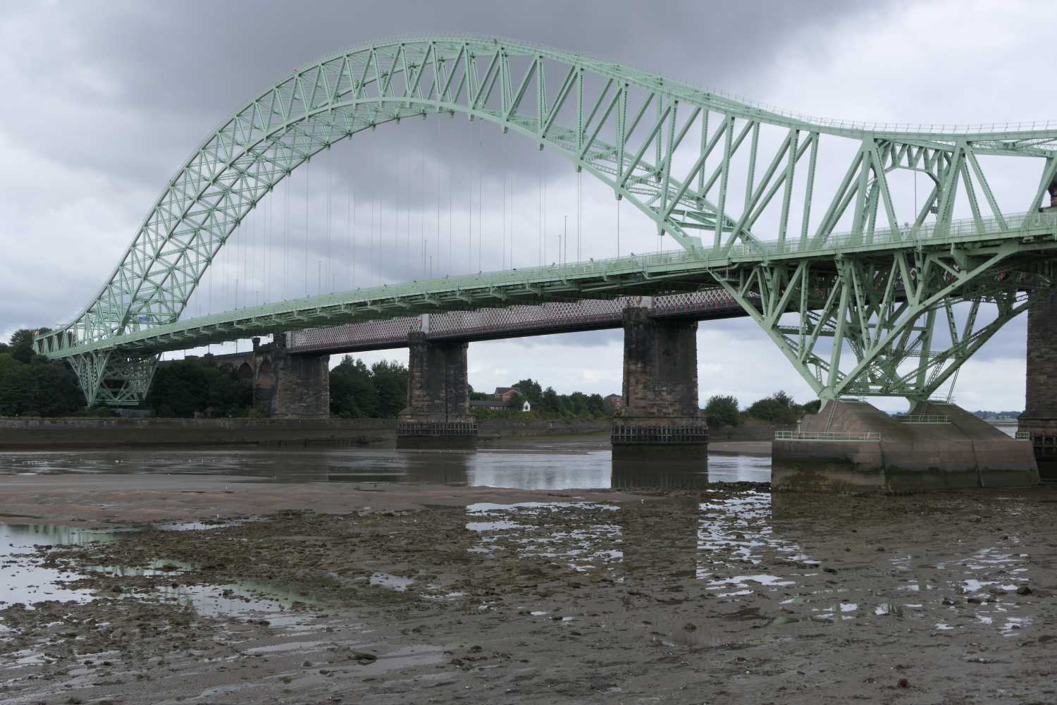 The silver jubilee bridge, with the railway bridge hidden behind