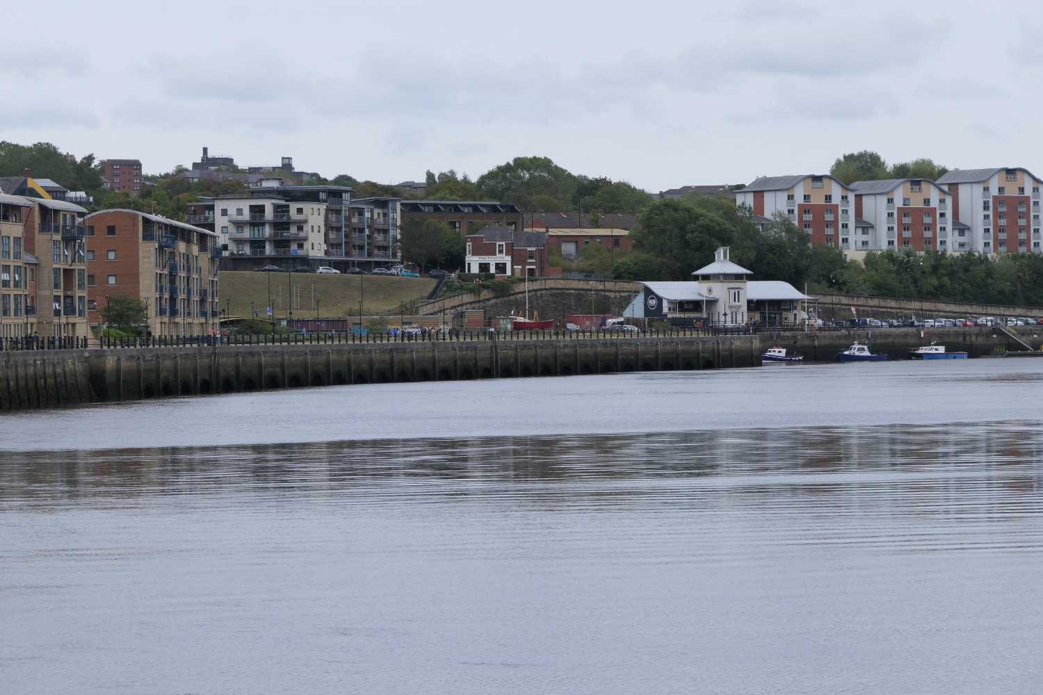 View along the river showing the free trade inn in the distance