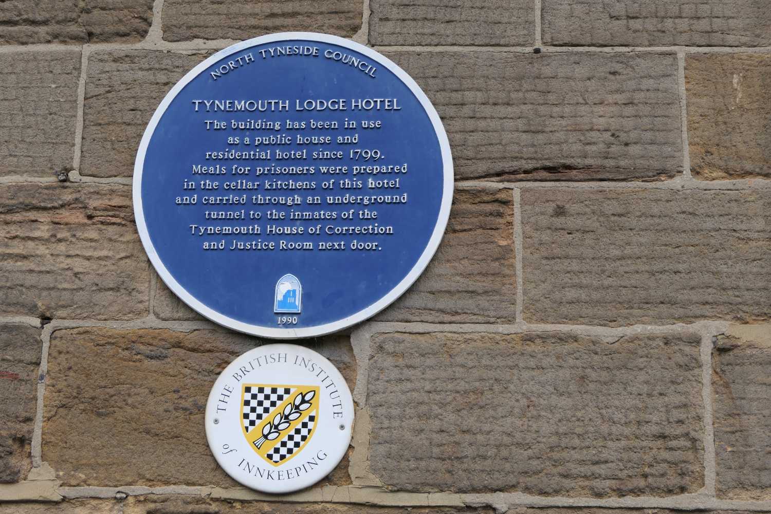 Blue plack on the wall of the Tynemouth Lodge Hotel