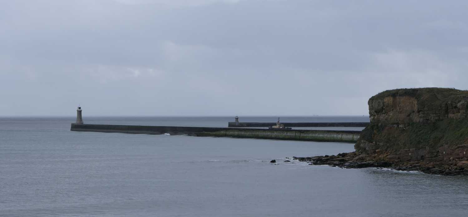 Boat leaving the tyne heading out to sea