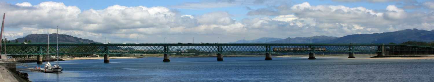View along river towards the bridge