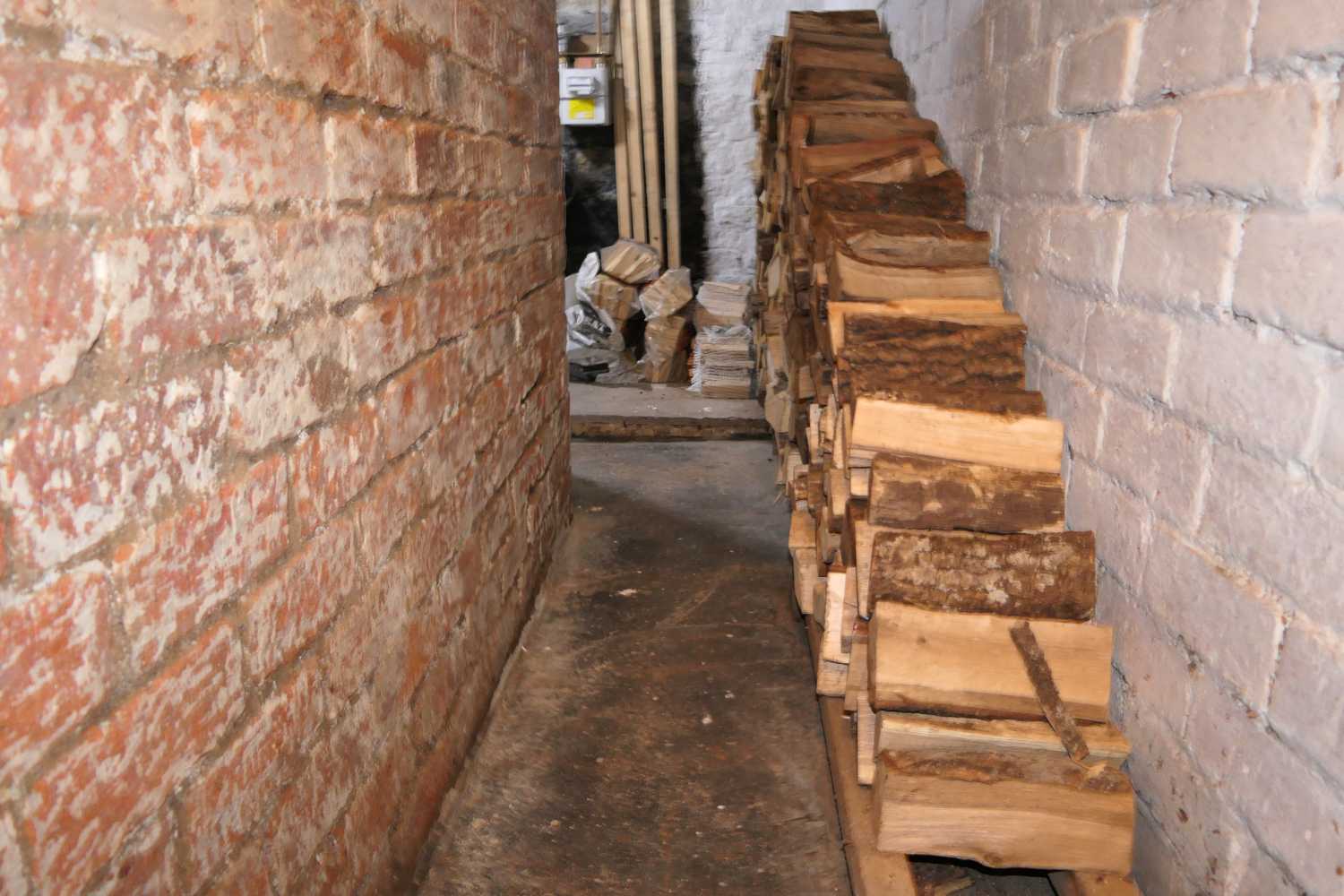 The logs stacked in the cellar