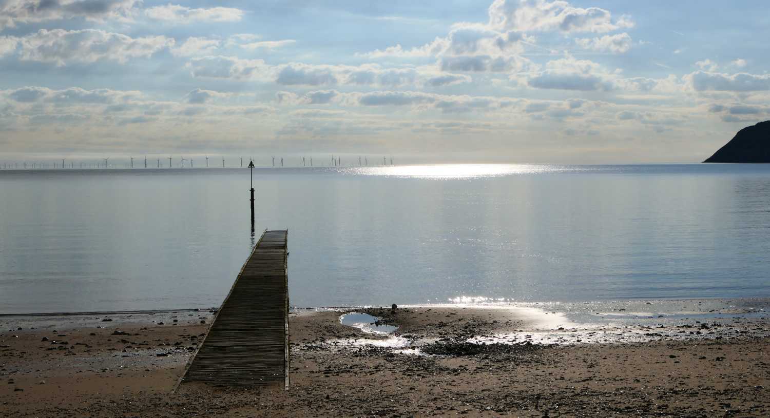 Looking out to sea, into the sun