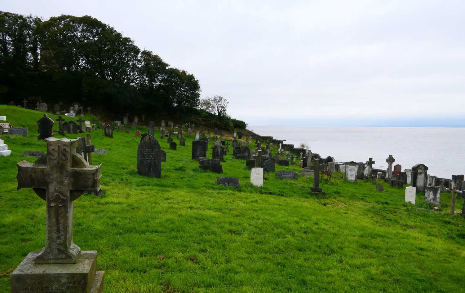 Looking south along the coast, from the church